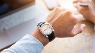 Man looking at his watch
