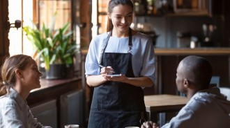 Female waitress at a pub