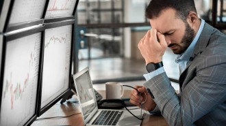 Unhappy man looking at trading