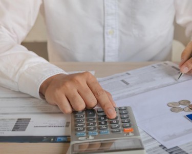 Business man with a calculator