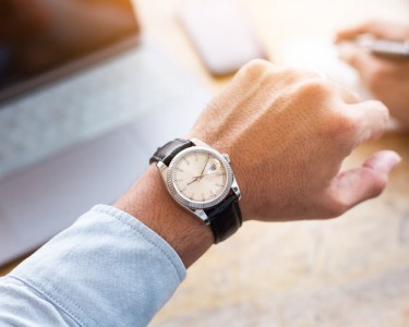 Man looking at his watch