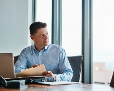Businessman looking out the window