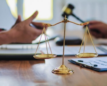 Brass scales in court