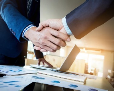 Shaking hands on dissolving a company